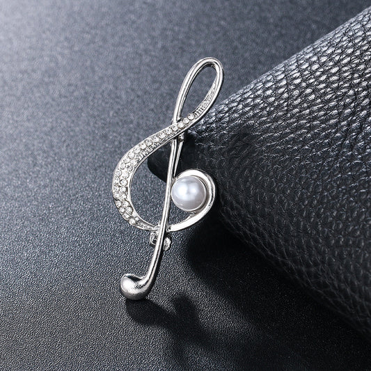 "Harmony Elegance Faux Diamond and Pearl Clef Brooch"