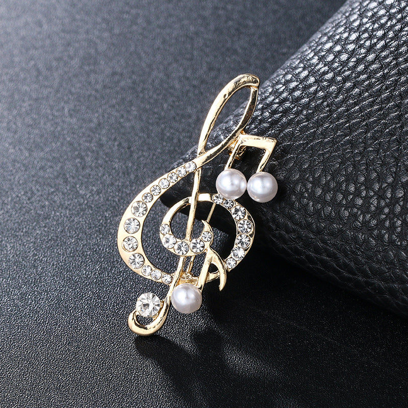 "Harmony Elegance Faux Diamond and Pearl Clef Brooch"