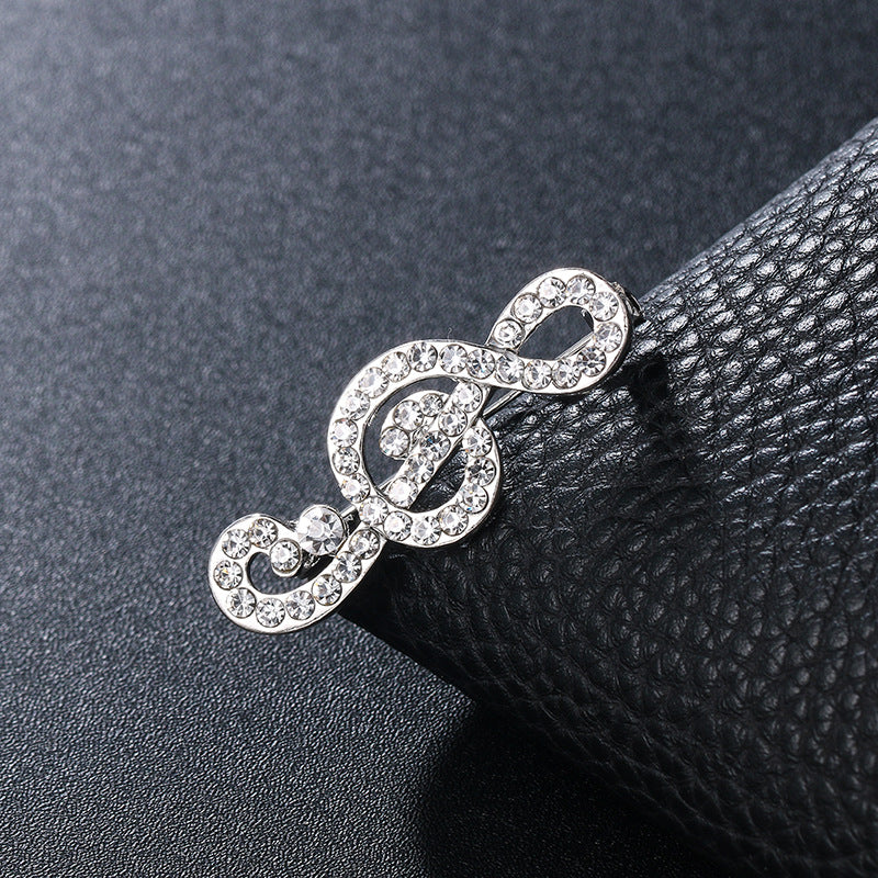 "Harmony Elegance Faux Diamond and Pearl Clef Brooch"