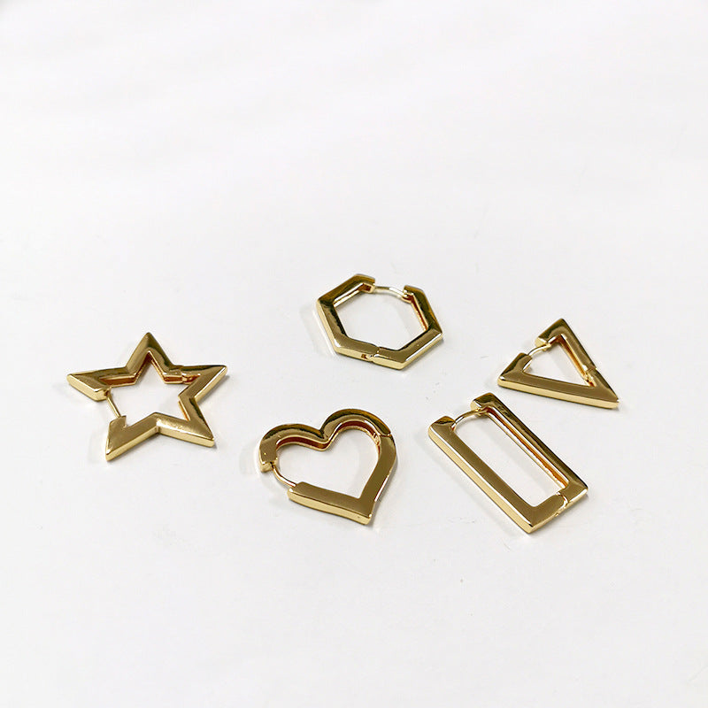 Gold colored geometric-shaped earrings