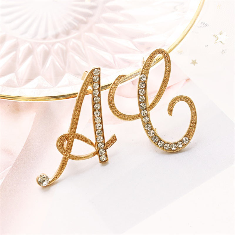 Queen's Alphabet Brooches With Diamonds